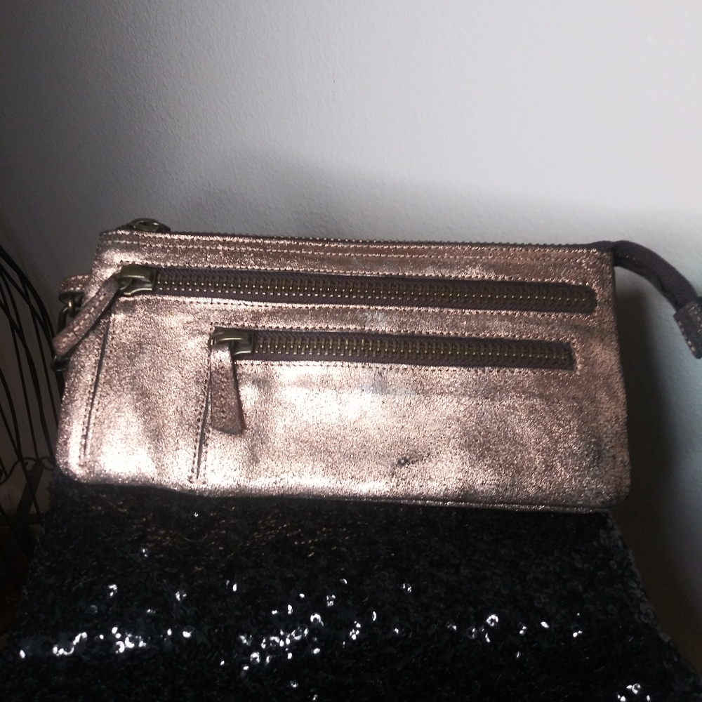 HOLDING HORSES rose gold clutch